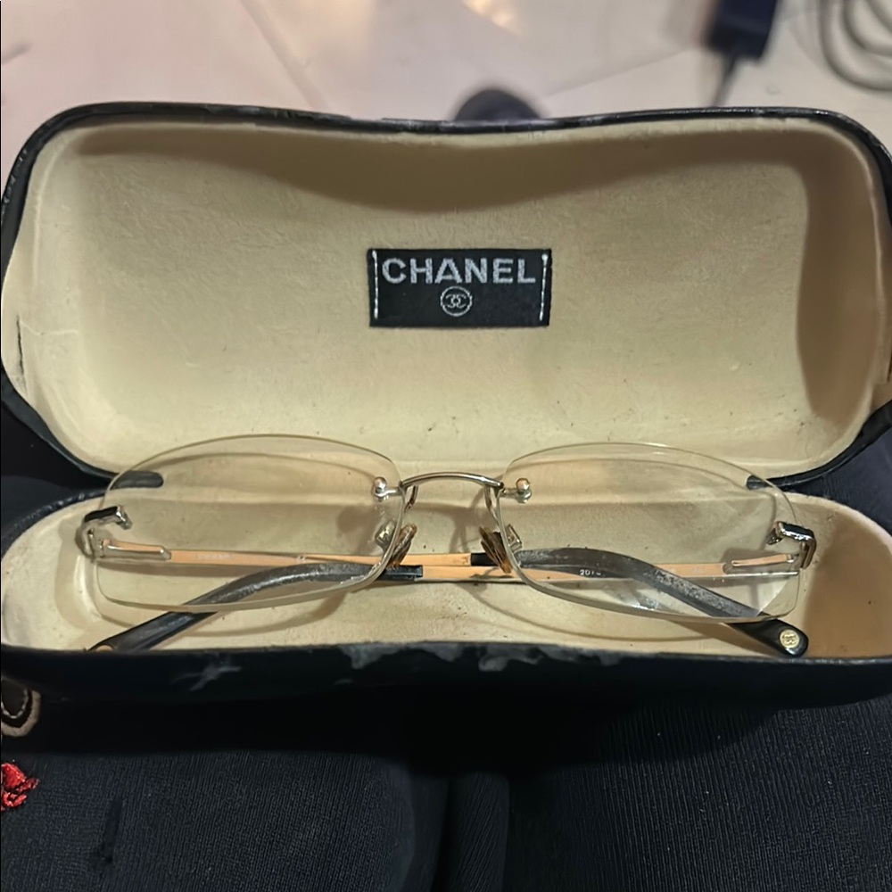 CHANEL Silver and Gold Rimless Glasses